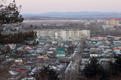 High angle shot of townscape against sky