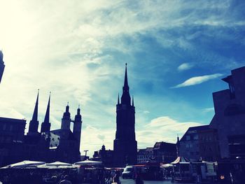 Low angle view of church against cloudy sky