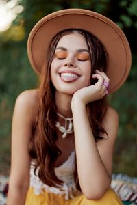 Young woman wearing hat