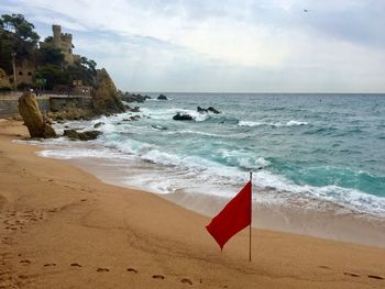 Scenic view of beach against sky