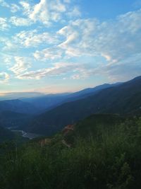 Scenic view of landscape against sky during sunset