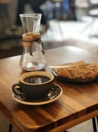 Close-up of coffee cup on table