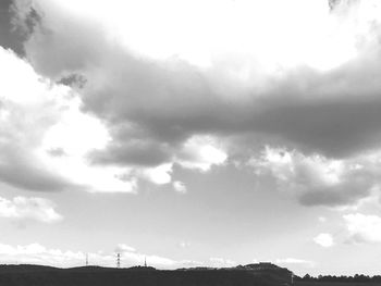 Low angle view of silhouette mountain against sky