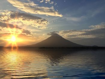 Scenic view of sunset over river