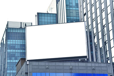 Low angle view of modern building against clear sky