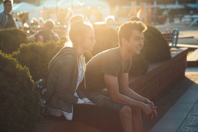 Group of people sitting outdoors