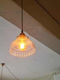 Low angle view of illuminated light bulb