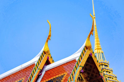 Golden spires at a temple. bangkok, thailand.