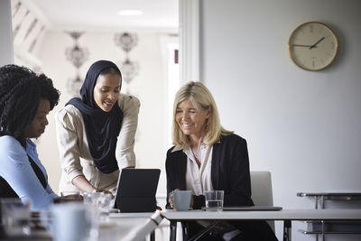 Businesswomen talking at meeting