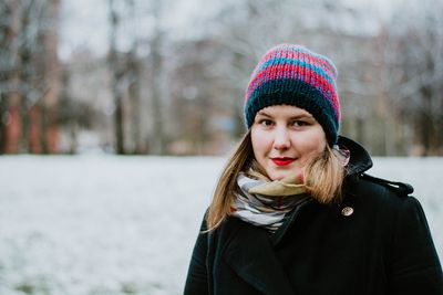 Close-up of young woman in winter