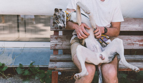 Man holding dog