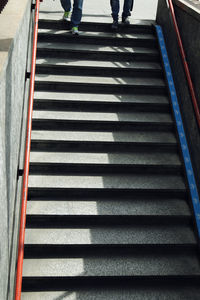 Low section of woman on steps