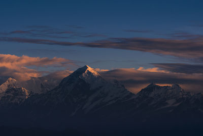 First ray of morning sun on the majestic kangchenjunga range, viewed from sandakphu.