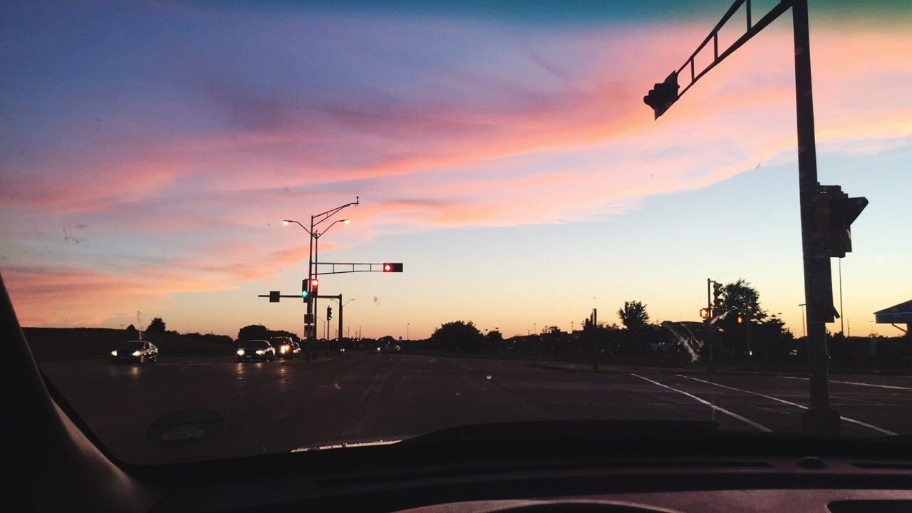 car, transportation, sky, mode of transport, sunset, road, land vehicle, cloud - sky, no people, car interior, silhouette, nature, outdoors, day