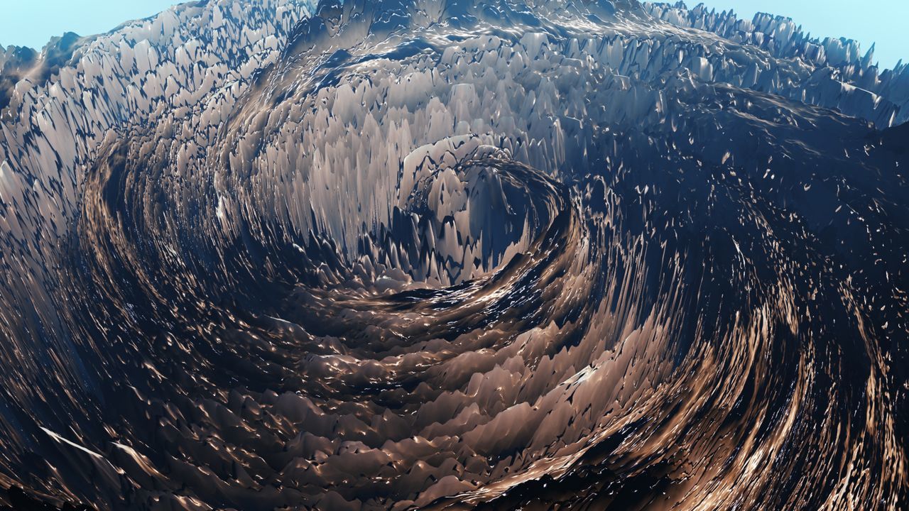 CLOSE-UP OF WET SAND ON SEA