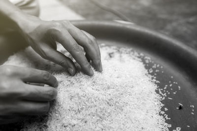 Cropped hand of person washing hands