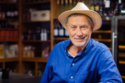 Portrait of senior man wearing hat