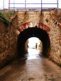 Tunnel seen through arch bridge