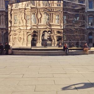 Tourists in front of historic building