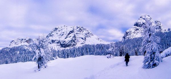 Scenic view of snow covered mountains