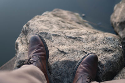 Low section of man on rock