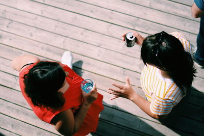 High angle view of people sitting outdoors