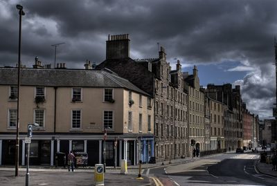 Buildings in city against sky