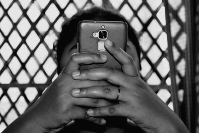 Close-up of woman using mobile phone