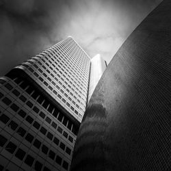 Low angle view of modern buildings against sky