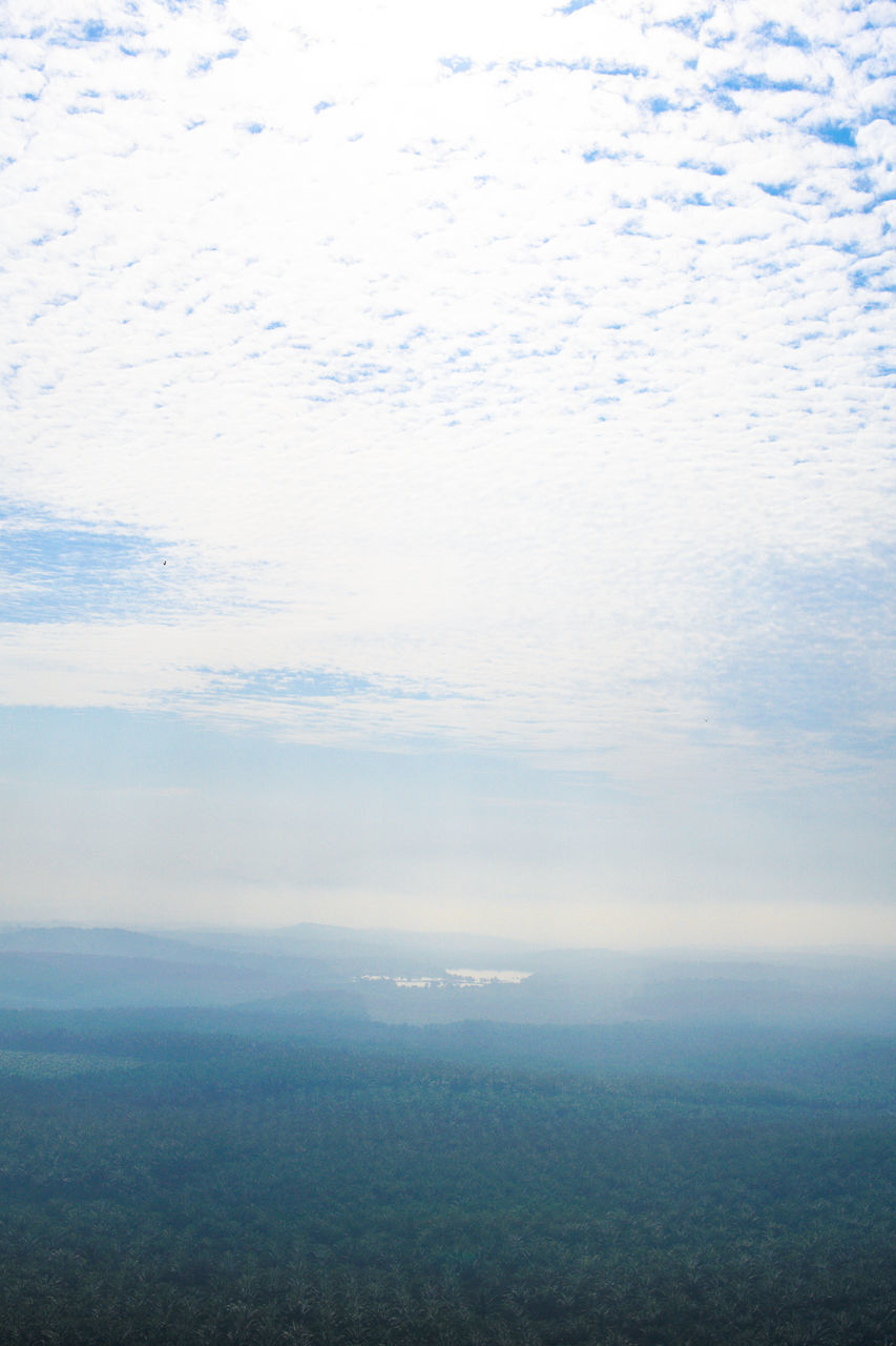 SCENIC VIEW OF FOG OVER LANDSCAPE AGAINST SKY