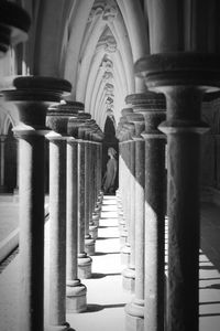 Rear view of man in corridor of building