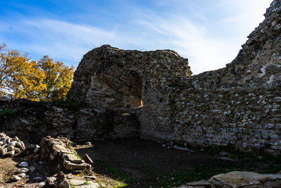 Old stone wall against sky