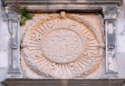 Close-up of carving on wall