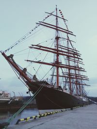 Low angle view of boat sailing in sea