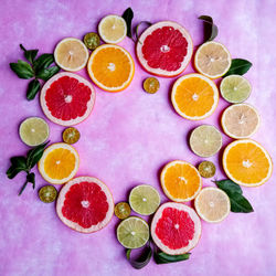 High angle view of various citrus fruits on table