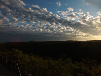 Scenic view of landscape against sky during sunset