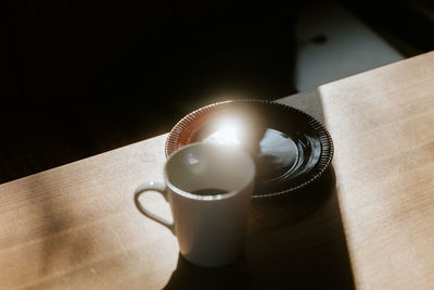 Close-up of coffee cup on table