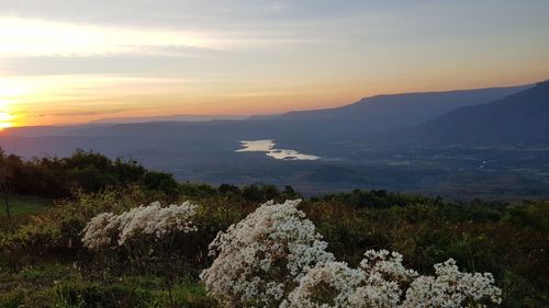 Scenic view of sea against sky during sunset