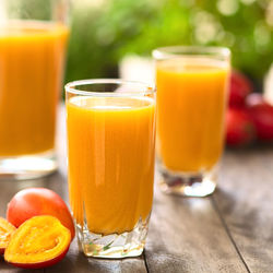 Close-up of tamarillo juice on table