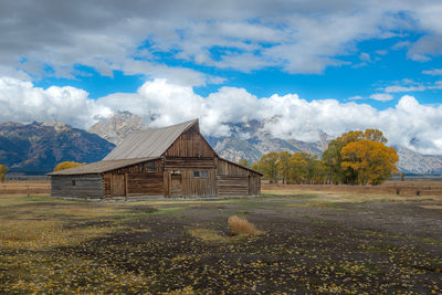 House on field against sky