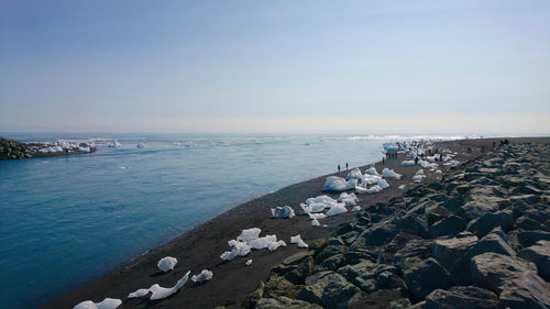 Scenic view of sea against clear blue sky