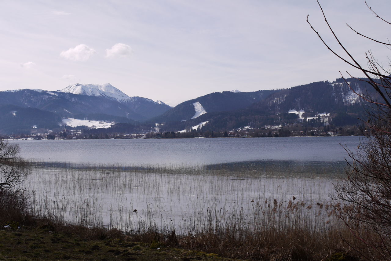 SCENIC VIEW OF LAKE AND MOUNTAINS