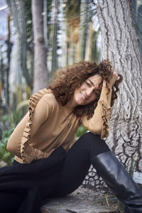 Portrait of mature woman sitting at park