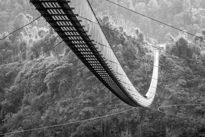 Low angle view of cables against sky