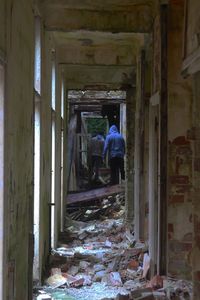 Man walking in corridor