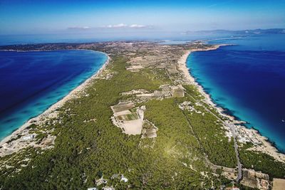 High angle view of sea shore against sky