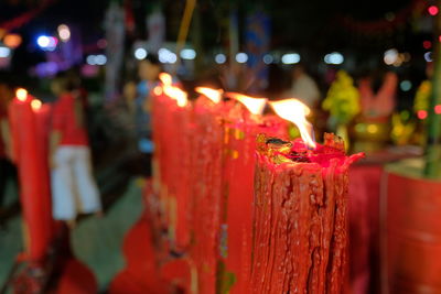 Close-up of burning candles