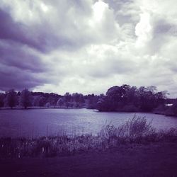 Scenic view of landscape against cloudy sky