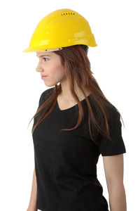 Low section of woman standing against white background