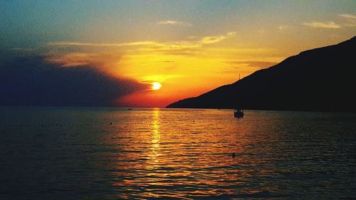 Scenic view of sea at sunset